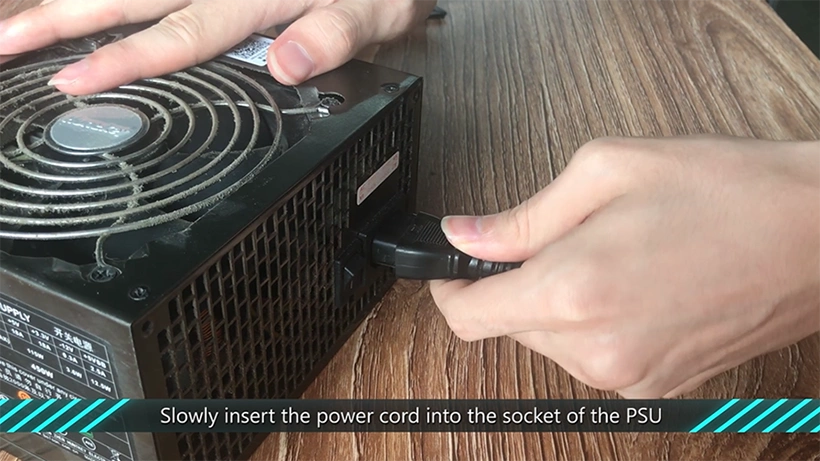 insert power cord into psu socket