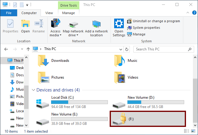 It shows a big golden lock on the USB drive when it is successfully encrypted