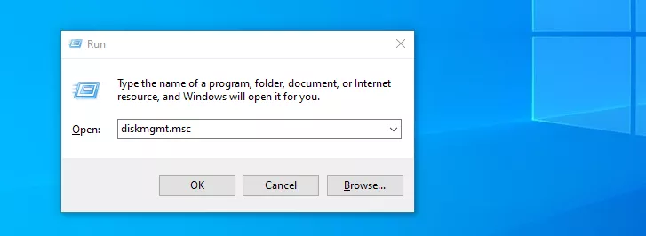 type diskmgmt.msc on the open field
